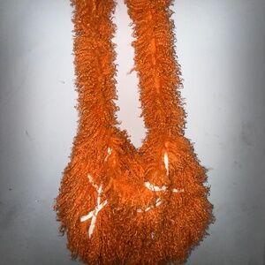 Orange punk fur hobo bag